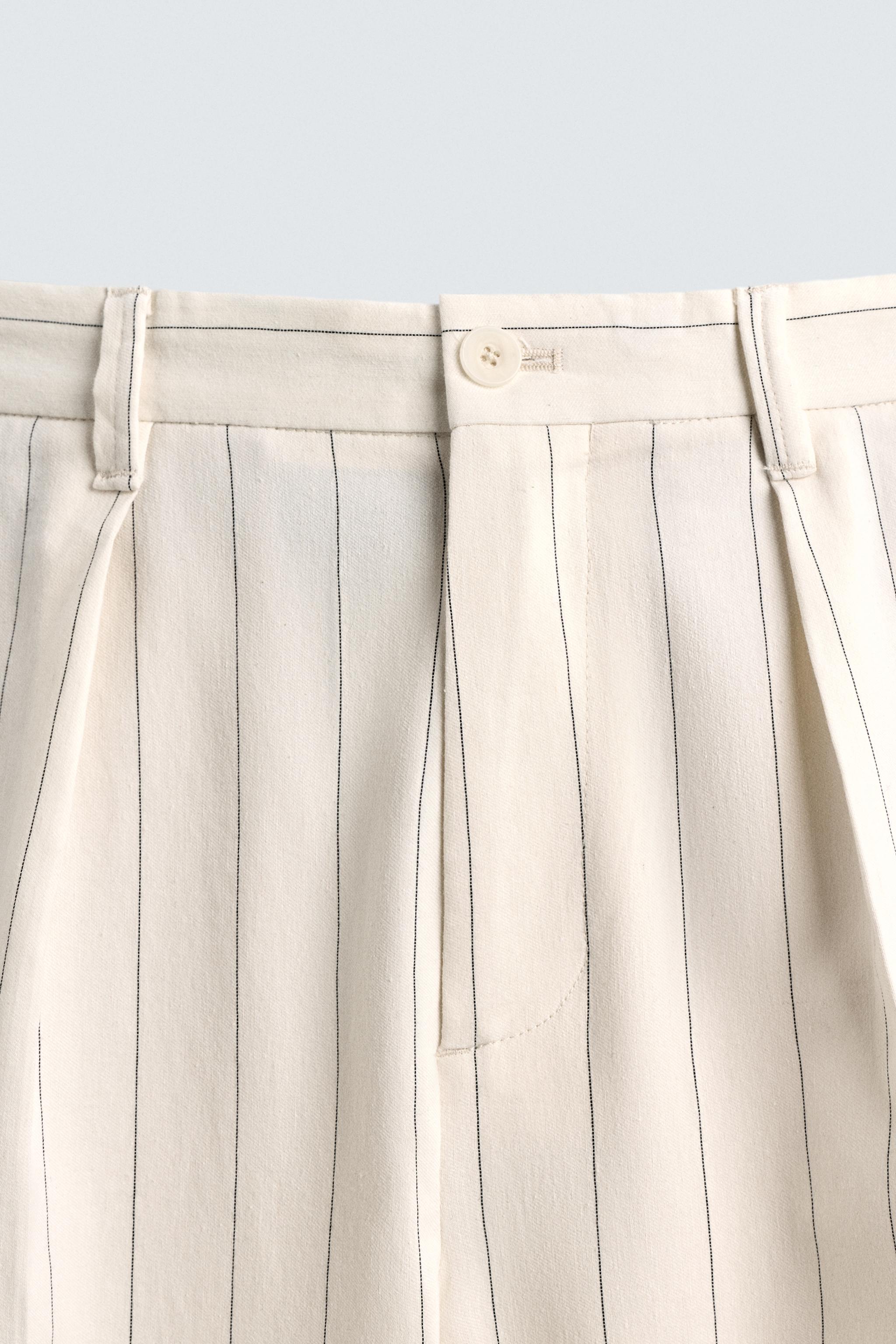 PLEATED STRIPE PANTS